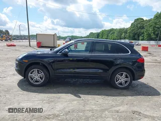 2011 Porsche Cayenne S Hybrid with VIN WP1AE2A20BLA92714, listed as a IAAI auction lot 42255019 with 101,274 mi miles and . Bid and sale history available at DreamBid. Image 14.