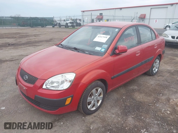 2009 Kia Rio SX with VIN KNADE223996556806, listed as a IAAI auction lot 42117938 with 54,007 mi miles. Bid and sale history available at carsss.com. Image 2.