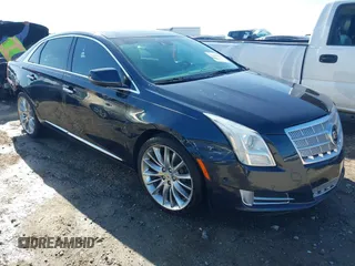 2014 Cadillac XTS Platinum z VIN 2G61S5S32E9131823, wystawiony jako IAAI lot #41467610 z przebiegiem 139 941 mil mil oraz . Historia ofert i sprzedaży dostępna na DreamBid. Obrazek 1.