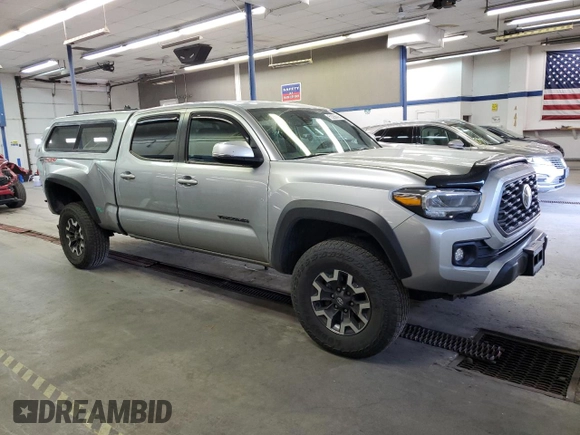 2023 Toyota Tacoma SR5 z VIN 3TMDZ5BNXPM165719, wystawiony jako Copart lot #58256035 z przebiegiem 13 681 mil mil oraz Szkoda całkowita • Salvage title. Historia ofert i sprzedaży dostępna na DreamBid. Obrazek 4.