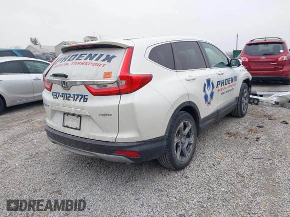 2017 Honda CR-V EX with VIN 2HKRW2H56HH682396, listed as a IAAI auction lot 41569854 with 74,392 mi miles. Bid and sale history available at carsss.com. Image 4.