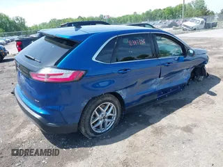 2024 Ford Edge SEL z VIN 2FMPK4J96RBB00933, wystawiony jako IAAI lot #42393326 z przebiegiem 28 710 mil mil oraz . Historia ofert i sprzedaży dostępna na DreamBid. Obrazek 4.