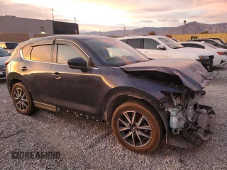 2018 Mazda CX-5 Grand Touring with VIN JM3KFBDM9J1326933, listed as a Copart auction lot 82180164 with 99,574 mi miles and Salvage title. Bid and sale history available at DreamBid. Image 4.