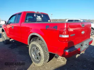 2004 Ford F-150 XLT with VIN 1FTPX14524NA28252, listed as a IAAI auction lot 41753719 with 165,179 mi miles. Bid and sale history available at carsss.com. Image 3.