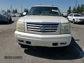 2003 Cadillac Escalade z VIN 1GYEK63NX3R256926, wystawiony jako Copart lot #52764695 z przebiegiem 195 641 mil mil oraz Szkoda całkowita • Salvage title. Historia ofert i sprzedaży dostępna na DreamBid. Obrazek 12.