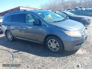 2013 Honda Odyssey EX-L with VIN 5FNRL5H66DB041471, listed as a IAAI auction lot 41543113 with 171,612 mi miles. Bid and sale history available at carsss.com. Image 1.