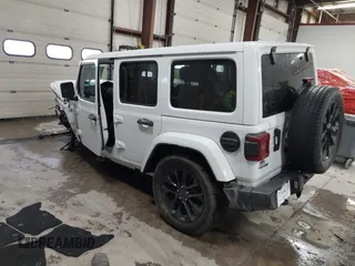 2021 Jeep Wrangler Unlimited Sahara with VIN 1C4JJXP60MW830307, listed as a IAAI auction lot 41869863 with 37,201 mi miles and . Bid and sale history available at DreamBid. Image 3.