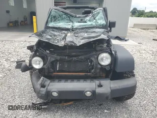 2015 Jeep Wrangler Rubicon with VIN 1C4HJWCG0FL755717, listed as a Copart auction lot 61375435 with 153,207 mi miles and Salvage title. Bid and sale history available at DreamBid. Image 5.