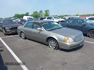 2002 Cadillac DeVille z VIN 1G6KD54Y12U219770, wystawiony jako IAAI lot #42474317 z przebiegiem 122 776 mil mil oraz . Historia ofert i sprzedaży dostępna na DreamBid. Obrazek 1.