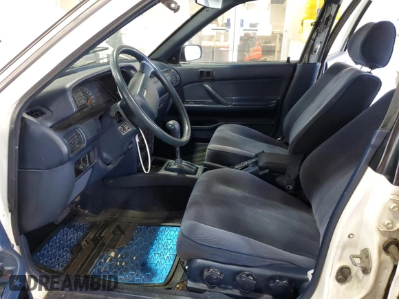 1991 Toyota Camry z VIN JT2SV21W7M0380204, wystawiony jako Copart lot #72694404 z przebiegiem 242 162 mil mil oraz Szkoda całkowita • Salvage title. Historia ofert i sprzedaży dostępna na DreamBid. Obrazek 7.