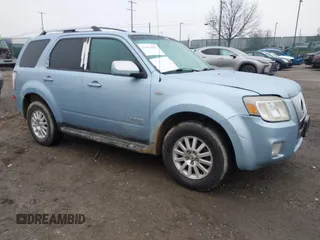 2008 Mercury Mariner Premier z VIN 4M2CU97158KJ04790, wystawiony jako IAAI lot #41061682 z przebiegiem 196 724 mil mil oraz . Historia ofert i sprzedaży dostępna na DreamBid. Obrazek 1.