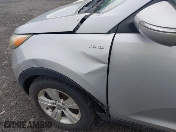 2012 Kia Sportage LX with VIN KNDPBCA25C7280598, listed as a IAAI auction lot 42223042 with 147,507 mi miles and . Bid and sale history available at DreamBid. Image 12.