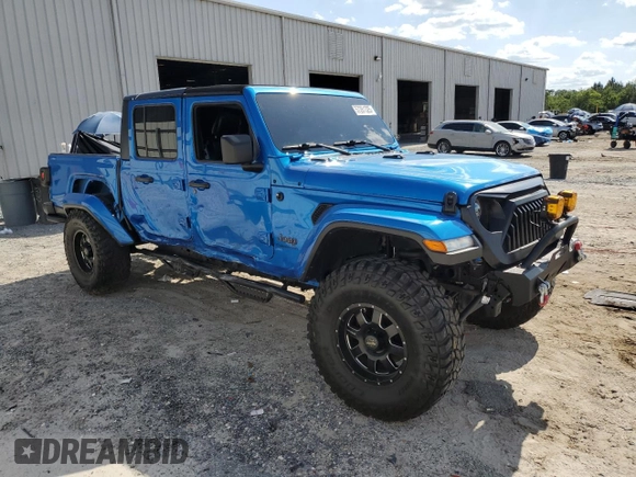 2020 Jeep Gladiator Overland with VIN 1C6HJTFG4LL162262, listed as a Copart auction lot 57261325 with 74,856 mi miles and Salvage title. Bid and sale history available at DreamBid. Image 4.