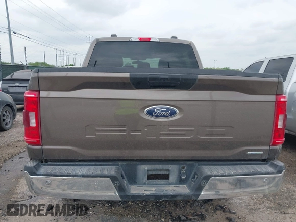 2023 Ford F-150 XL with VIN 1FTFW1E81PFB71702, listed as a IAAI auction lot 42102699 with 57,007 mi miles. Bid and sale history available at carsss.com. Image 16.