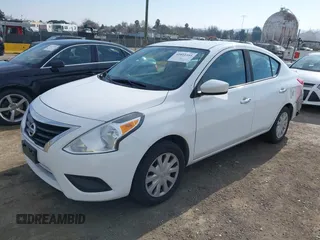 2016 Nissan Versa S Plus with VIN 3N1CN7AP6GL886585, listed as a IAAI auction lot 41411441 with 128,283 mi miles. Bid and sale history available at carsss.com. Image 2.