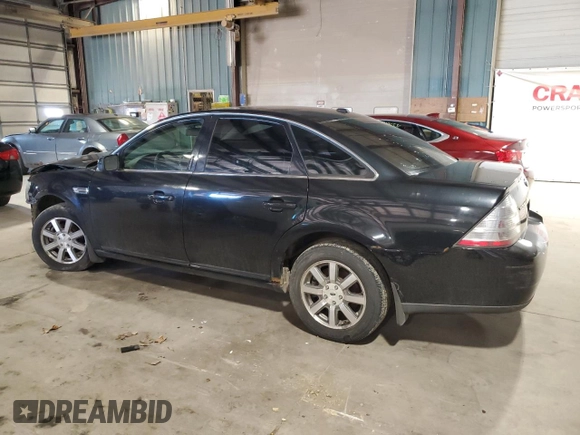 2009 Ford Taurus SEL with VIN 1FAHP27W99G102850, listed as a Copart auction lot 50009975 with 184,829 mi miles and Salvage Title. Bid and sale history available at carsss.com. Image 2.
