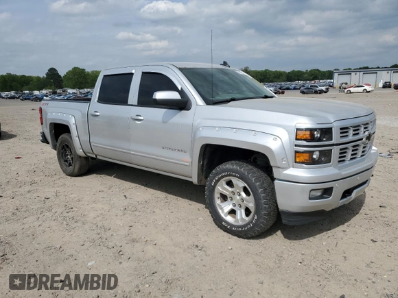 2015 Chevrolet Silverado 1500 LT with VIN 3GCUKREC9FG147988, listed as a Copart auction lot 53784635 with 218,260 mi miles and Salvage Title. Bid and sale history available at DreamBid. Image 4.