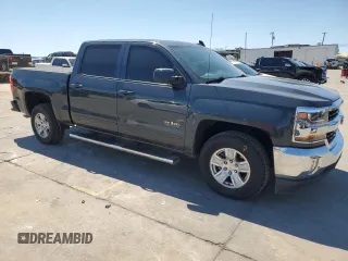 2017 Chevrolet Silverado 1500 LT with VIN 3GCPCREH7HG510944, listed as a Copart auction lot 70825374 with 82,632 mi miles and Salvage Title. Bid and sale history available at DreamBid. Image 4.