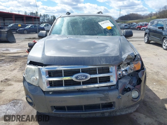 2012 Ford Escape XLT with VIN 1FMCU0D76CKC01916, listed as a IAAI auction lot 41879331 with 194,201 mi miles. Bid and sale history available at carsss.com. Image 11.