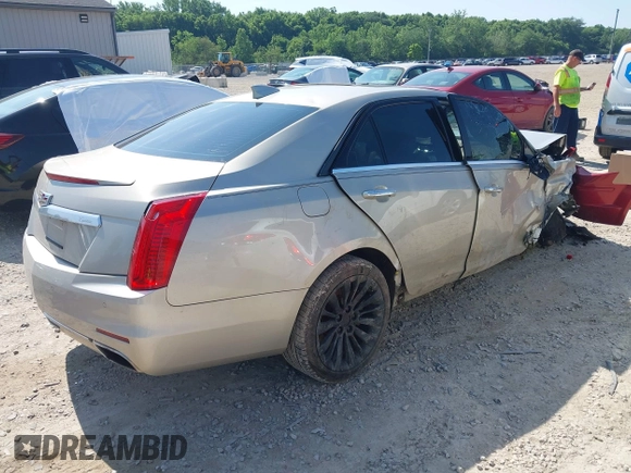 2015 Cadillac CTS Luxury AWD with VIN 1G6AX5SX7F0133440, listed as a IAAI auction lot 42560857 with 82,910 mi miles and . Bid and sale history available at DreamBid. Image 4.