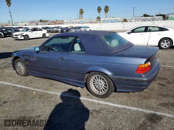 1999 BMW 3 Series 323icA with VIN WBABJ8332XEM24560, listed as a Copart auction lot 80756544 with 63,056 mi miles and Salvage Title. Bid and sale history available at carsss.com. Image 2.