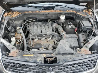 2011 Mitsubishi Endeavor LS with VIN 4A4JN2AS6BE032693, listed as a Copart auction lot 86910564 with 130,097 mi miles and Salvage Title. Bid and sale history available at carsss.com. Image 13.