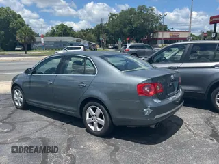 2006 Volkswagen Jetta z VIN 3VWRG81K46M724245, wystawiony jako Copart lot #57293785 z przebiegiem 212 639 mil mil oraz Czysty tytuł • Clean title. Historia ofert i sprzedaży dostępna na DreamBid. Obrazek 3.
