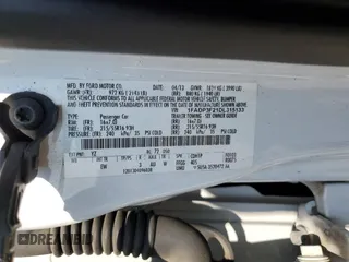 2013 Ford Focus SE with VIN 1FADP3F21DL315133, listed as a Copart auction lot 60502705 with 123,504 mi miles and Salvage title. Bid and sale history available at DreamBid. Image 12.