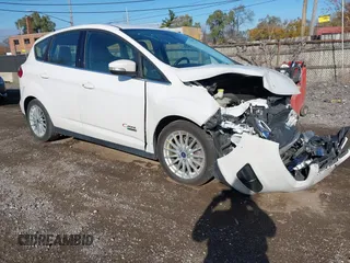 2013 Ford C-Max Energi SEL with VIN 1FADP5CU5DL536509, listed as a IAAI auction lot 40780927 with Not Provided miles. Bid and sale history available at carsss.com. Image 1.