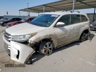 2019 Toyota Highlander LE with VIN 5TDBZRFH5KS708731, listed as a Copart auction lot 58038865 with 74,695 mi miles and Salvage title. Bid and sale history available at DreamBid. Image 1.