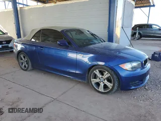 2010 BMW 1 Series 128i with VIN WBAUL7C50AVJ77979, listed as a Copart auction lot 79938664 with 53,740 mi miles and Salvage title. Bid and sale history available at DreamBid. Image 4.