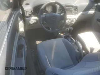 2011 Hyundai Accent GS z VIN KMHCM3AC6BU198599, wystawiony jako Copart lot #52154795 z przebiegiem 116 842 mil mil oraz Szkoda całkowita • Salvage title. Historia ofert i sprzedaży dostępna na DreamBid. Obrazek 8.