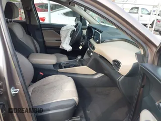 2020 Hyundai Santa Fe SE with VIN 5NMS23AD6LH220012, listed as a IAAI auction lot 42317046 with 141,055 mi miles and . Bid and sale history available at DreamBid. Image 5.