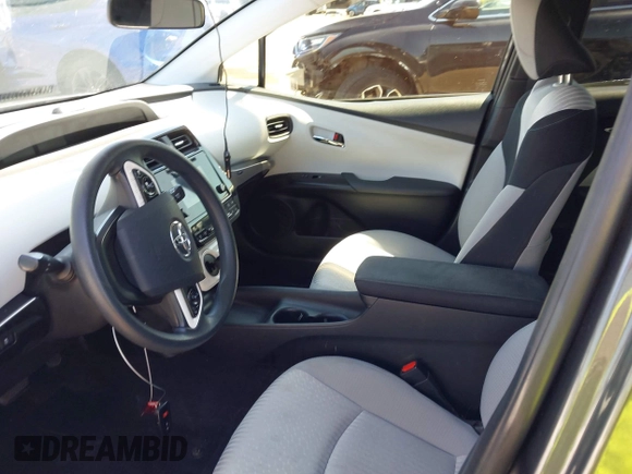 2016 Toyota Prius Two z VIN JTDKBRFU1G3521884, wystawiony jako IAAI lot #42081852 z przebiegiem 93 107 mil mil oraz . Historia ofert i sprzedaży dostępna na DreamBid. Obrazek 5.