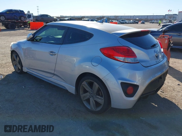 2013 Hyundai Veloster Turbo with VIN KMHTC6AE6DU162372, listed as a IAAI auction lot 41481820 with 105,650 mi miles and . Bid and sale history available at DreamBid. Image 3.
