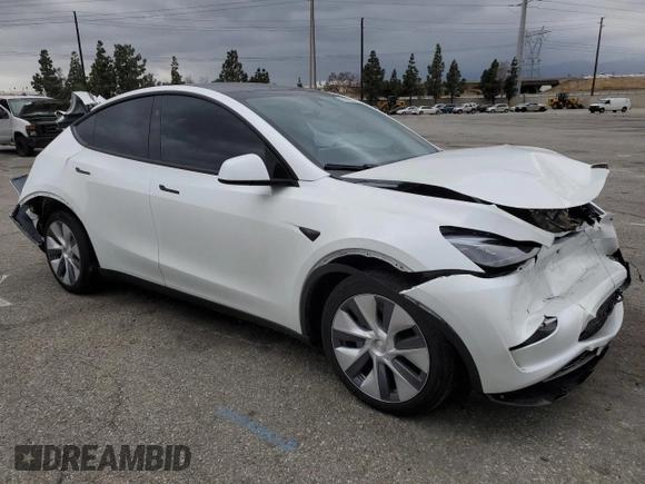 2024 Tesla Model Y Long Range with VIN 7SAYGDEE8RF088808, listed as a Copart auction lot 50406865 with 8,150 mi miles and Salvage title. Bid and sale history available at DreamBid. Image 4.