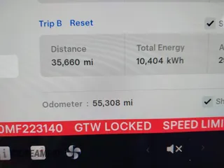 2021 Tesla Model Y Long Range with VIN 5YJYGAEE0MF223140, listed as a IAAI auction lot 42007701 with 55,308 mi miles. Bid and sale history available at carsss.com. Image 7.