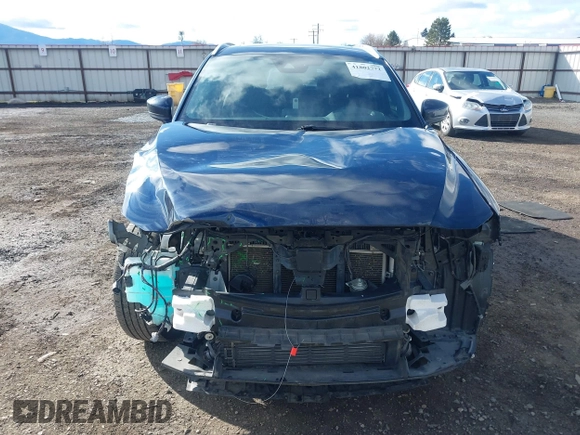 2019 Mazda CX-5 Signature with VIN JM3KFBEY5K0609063, listed as a IAAI auction lot 41802772 with 104,112 mi miles. Bid and sale history available at carsss.com. Image 13.