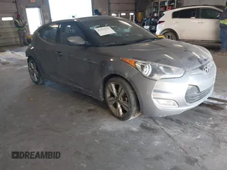 2017 Hyundai Veloster with VIN KMHTC6AD7HU321025, listed as a IAAI auction lot 41432334 with 88,647 mi miles. Bid and sale history available at carsss.com. Image 1.