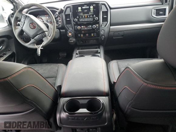 2024 Nissan Titan Pro-4X with VIN 1N6AA1ED1RN115335, listed as a Copart auction lot 42597585 with 5,381 mi miles and Salvage title. Bid and sale history available at DreamBid. Image 8.