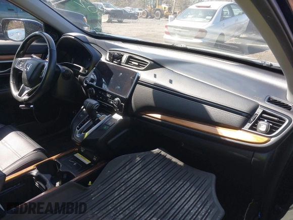 2020 Honda CR-V Touring with VIN 2HKRW2H98LH660573, listed as a IAAI auction lot 41524610 with 37,493 mi miles and . Bid and sale history available at DreamBid. Image 5.