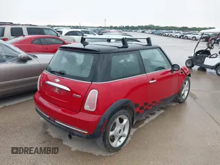 2005 MINI Hardtop with VIN WMWRC33415TJ67372, listed as a IAAI auction lot 42120875 with 153,727 mi miles and . Bid and sale history available at DreamBid. Image 4.