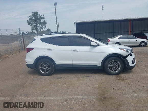 2017 Hyundai Santa Fe 2.4L z VIN 5NMZU3LB4HH026378, wystawiony jako IAAI lot #41906997 z przebiegiem 105 777 mil mil oraz . Historia ofert i sprzedaży dostępna na DreamBid. Obrazek 13.