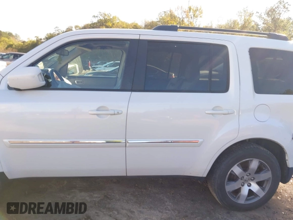 2013 Honda Pilot Touring with VIN 5FNYF4H95DB067812, listed as a IAAI auction lot 40919050 with 256,087 mi miles. Bid and sale history available at carsss.com. Image 14.