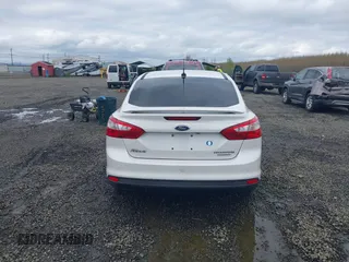 2014 Ford Focus Titanium with VIN 1FADP3J27EL142095, listed as a IAAI auction lot 42004419 with 139,515 mi miles. Bid and sale history available at carsss.com. Image 16.
