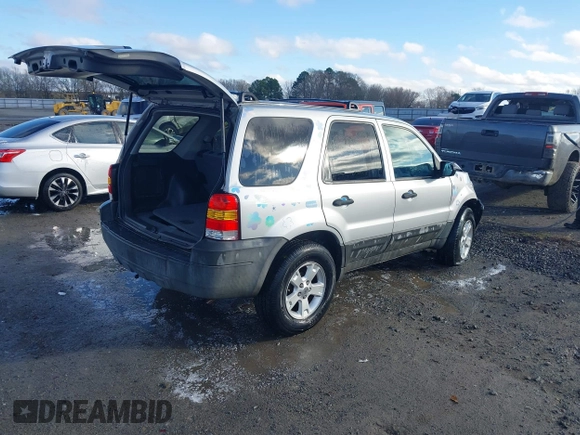 2007 Ford Escape XLT with VIN 1FMYU03Z37KA92572, listed as a IAAI auction lot 41213281 with 129,366 mi miles. Bid and sale history available at carsss.com. Image 4.