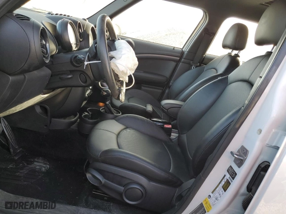 2014 MINI Cooper Countryman S with VIN WMWZC3C50EWT00792, listed as a Copart auction lot 87270074 with 52,525 mi miles and Salvage Title. Bid and sale history available at carsss.com. Image 7.