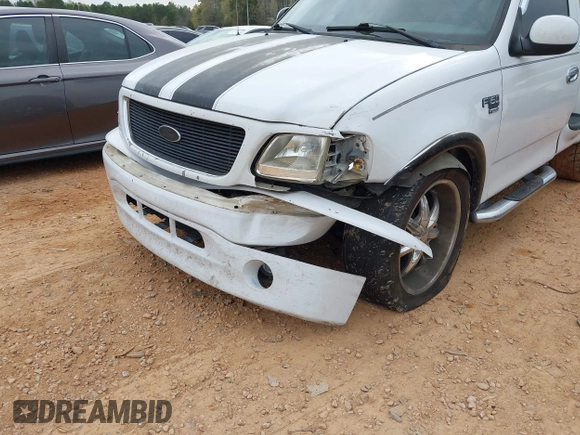 2003 Ford F-150 with VIN 2FTRF07W43CA38120, listed as a IAAI auction lot 41944774 with 195,327 mi miles and . Bid and sale history available at DreamBid. Image 6.