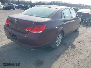 2005 Toyota Avalon XL with VIN 4T1BK36B25U057969, listed as a IAAI auction lot 41798579 with 241,831 mi miles. Bid and sale history available at carsss.com. Image 4.