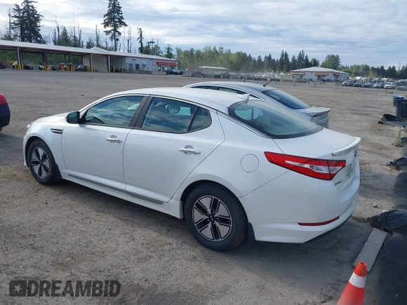 2012 Kia Optima Hybrid with VIN KNAGM4AD9C5011658, listed as a IAAI auction lot 42197129 with 142,977 mi miles. Bid and sale history available at carsss.com. Image 3.
